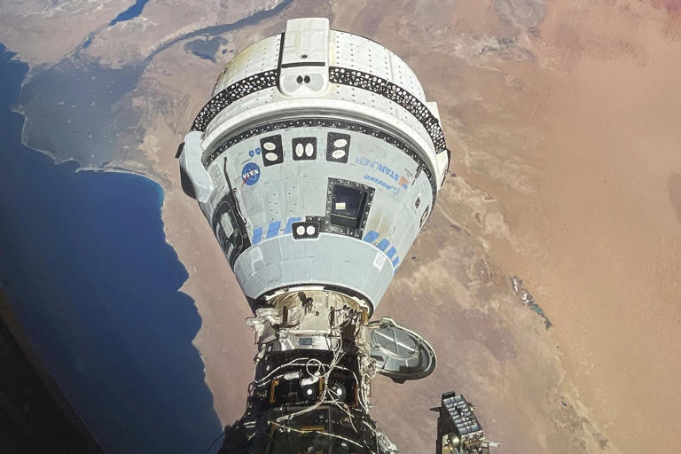 FILE - This photo provided by NASA shows the Starliner spacecraft docked to the Harmony module of the International Space Station, orbiting 262 miles above Egypt's Mediterranean coast, on June 13, 2024. (NASA via AP, File)