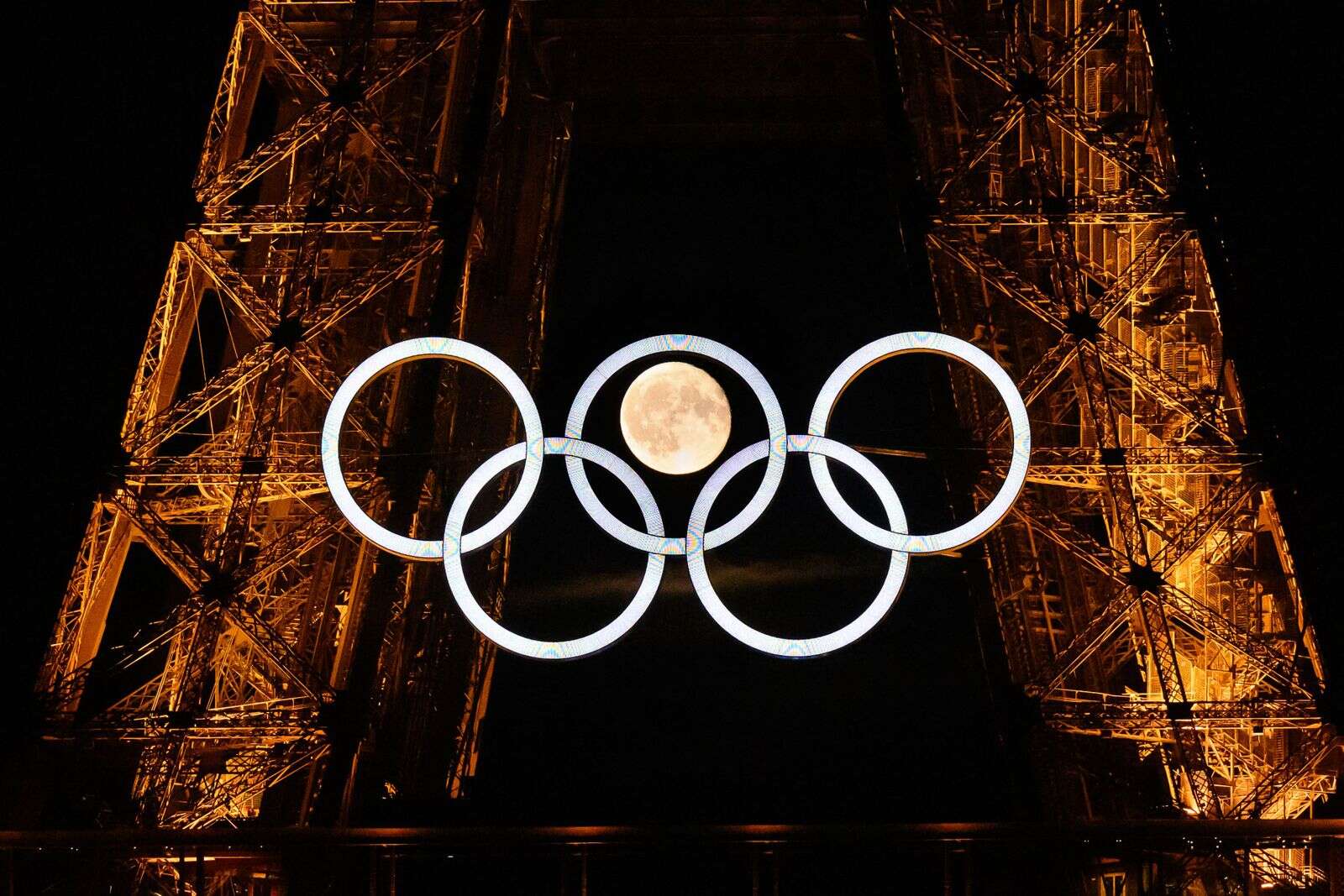 Eiffel Tower illuminated by Olympic rings ahead of Paris 2024 opening ceremony