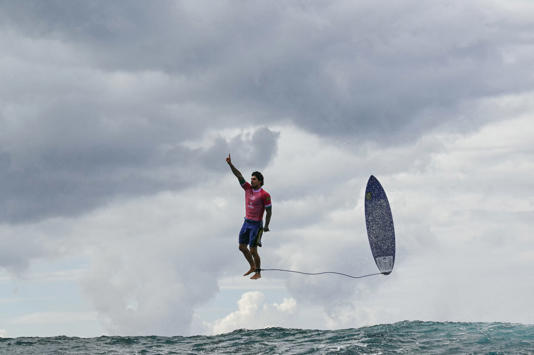 Stunning photo of Olympic surfer’s mid-air celebration goes viral