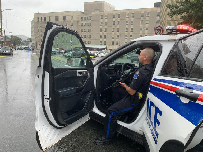 Royal Newfoundland Constabulary officers have St. Clare Avenue in front of St. Clare's Mercy Hospital blocked off at the intersection, due to a reported weapons offence in the area. (Malone Mullin/ CBC)