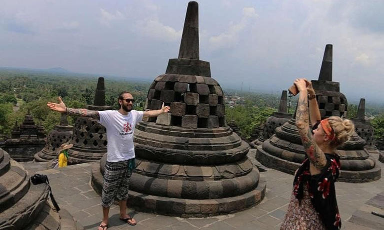 Foreign tourists seen at the Borobudur Temple in Magelang, Indonesia. Photo by Reuters
