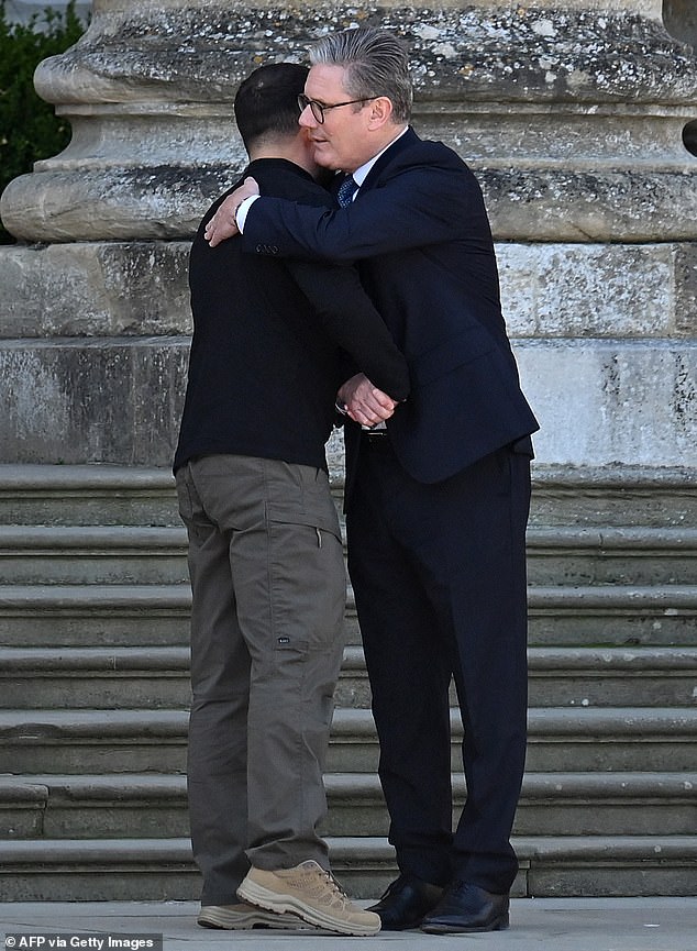 Zelensky Hugs Starmer, Hails Britain's 'resolve To Stop Putin Terror'