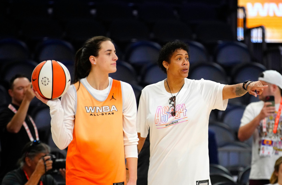 WNBA All-Star coach Cheryl Miller talks to Fever guard Caitlin Clark on Media Day at the Footprint Center on July 19, 2024. Patrick Breen/The Republic / USA TODAY NETWORK