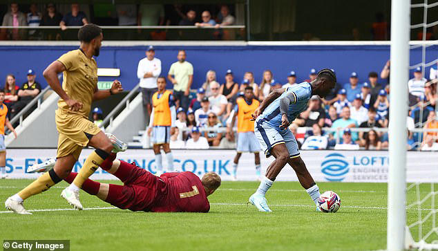 Yves Bissouma (right) fired Spurs 1-0 up in the 41st minute at Loftus Road in west London