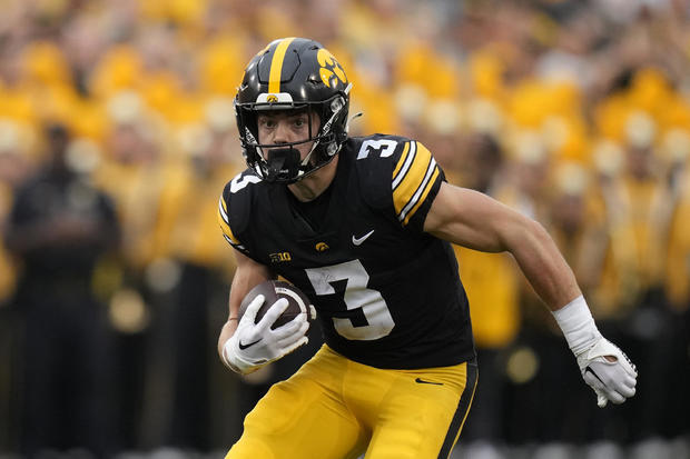 Iowa defensive back Cooper DeJean (3) returns a punt during the first half of an NCAA college football game against Western Michigan, Sept. 16, 2023, in Iowa City, Iowa. Charlie Neibergall / AP