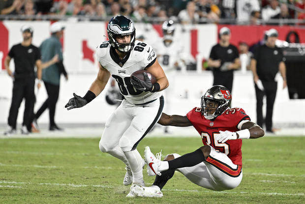 Philadelphia Eagles' Dallas Goedert, left, tries to get past Tampa Bay Buccaneers' Jamel Dean during the first half of an NFL football game Sept. 25, 2023, in Tampa, Florida. Jason Behnken / AP