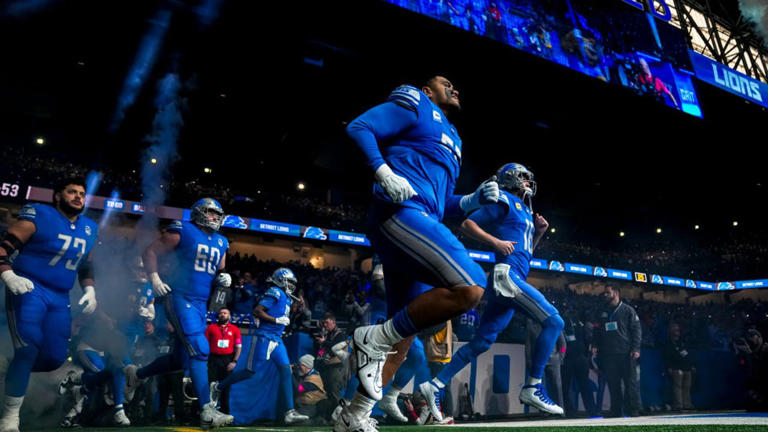 DETROIT, MICHIGAN - JANUARY 21: The Detroit Lions take the field before the game against the Tampa Bay Buccaneers at Ford Field on January 21, 2024 in Detroit, Michigan. (Photo by Nic Antaya/Getty Images)