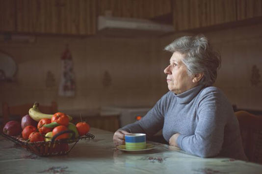 Woman sitting on her own