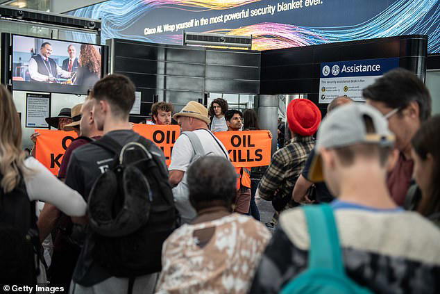 Just Stop Oil eco zealots try to block Heathrow Airport departure gate