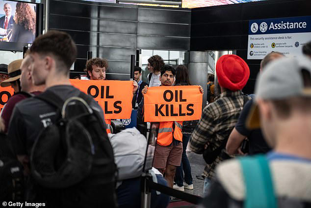 Just Stop Oil eco zealots try to block Heathrow Airport departure gate