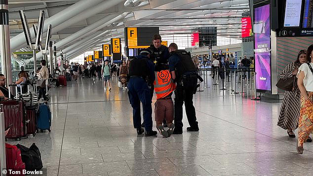 Just Stop Oil eco zealots try to block Heathrow Airport departure gate