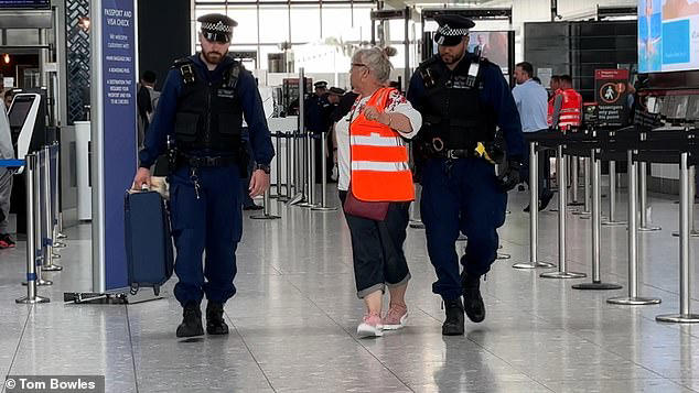 Just Stop Oil eco zealots try to block Heathrow Airport departure gate