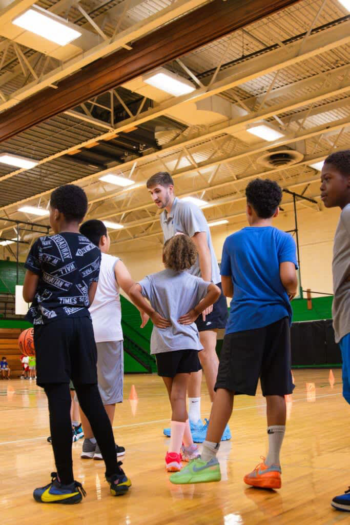 Andrew Carr talks to campers at S.T. Roach Basketball Camp - Paul Hooper, Lexington Parks & Recreation