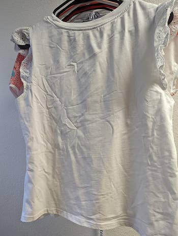 a reviewer photo of a shirt with wrinkles