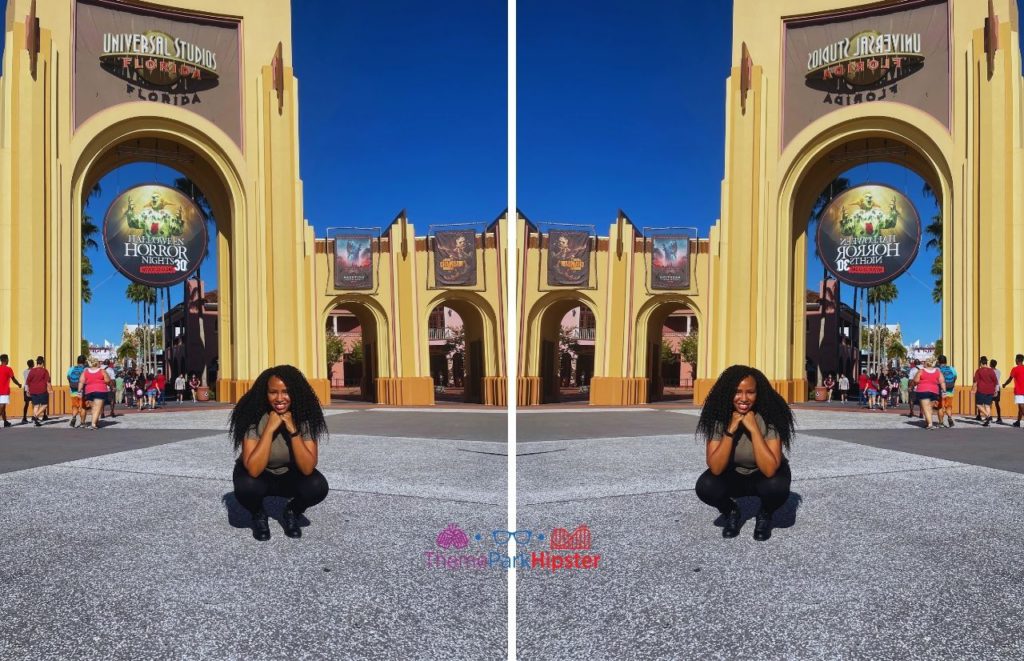 NikkyJ in front of Arches at HHN Universal Studios Halloween Horror Nights at Universal Orlando Resort. Keep reading to learn more about HHN hotels.