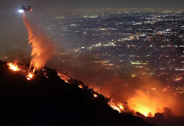 LA wildfires approach Hollywood sign as 180,000 evacuated and celebrity ...