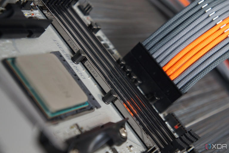 custom pc cable sleeved and inserted into motherboard