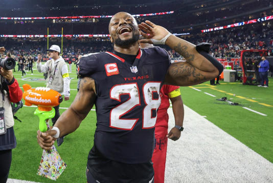 Texans running back Joe Mixon celebrates the team’s NFL playoff win over the Chargers on Jan. 11, 2025. Troy Taormina-Imagn Images
