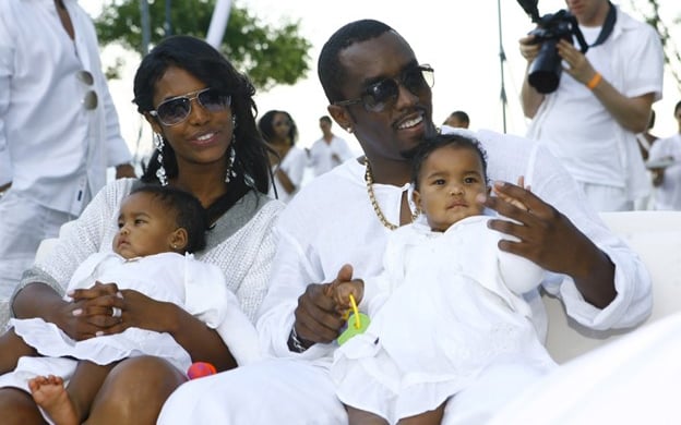 Porter, Combs and their twin daughters Jessie and D’lila at one of the mogul’s infamous white parties in 2007 (Supplied)