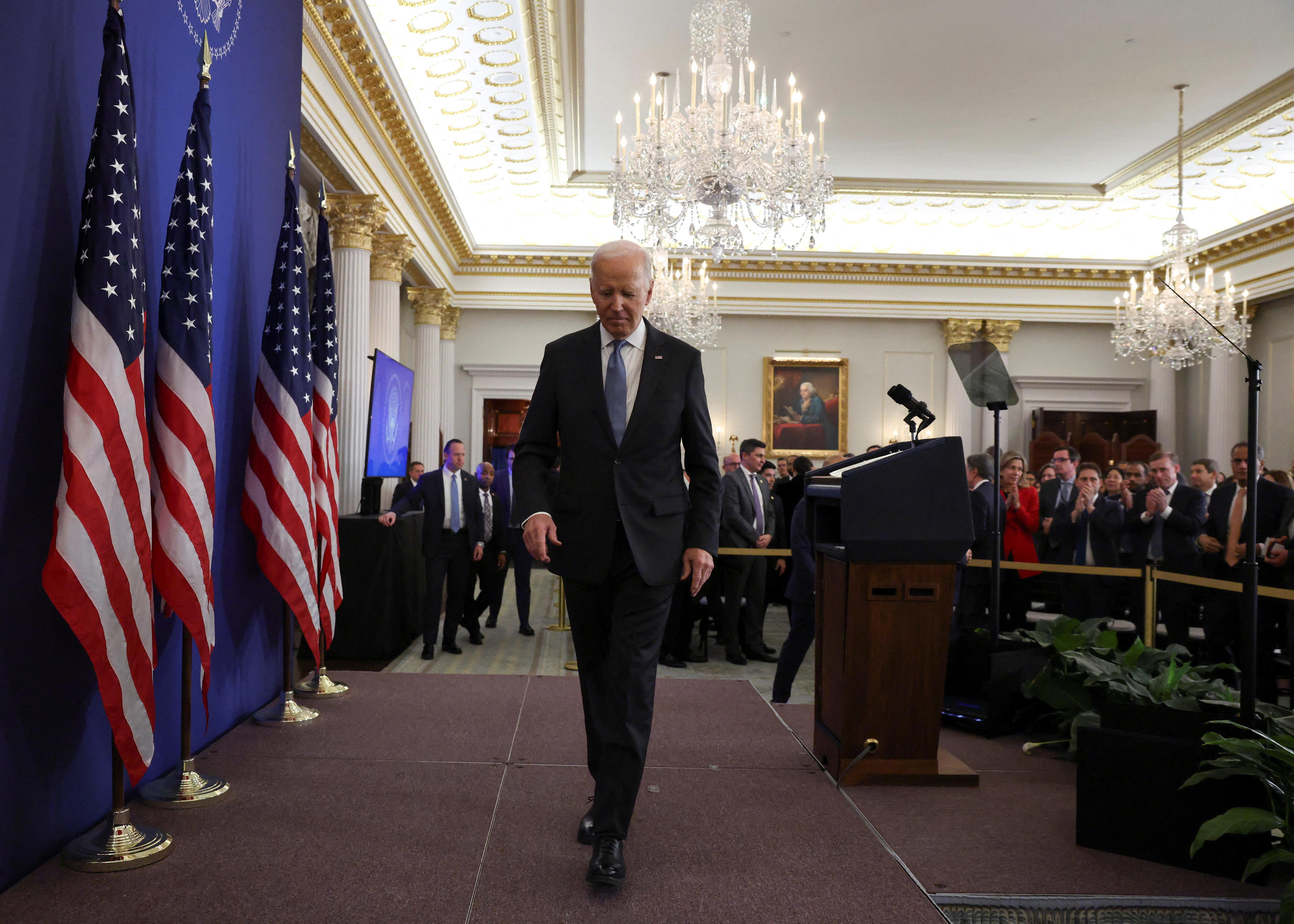 President Joe Biden leaves the stage after his speech at the State Department in Washington, D.C., on Jan. 13, 2025.