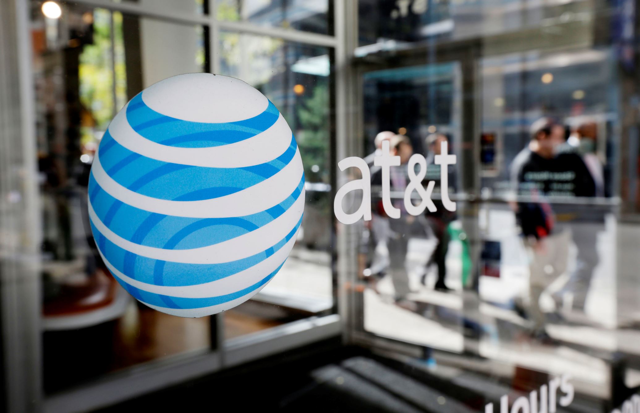 Trump calls for a boycott of AT&T to force changes at CNN