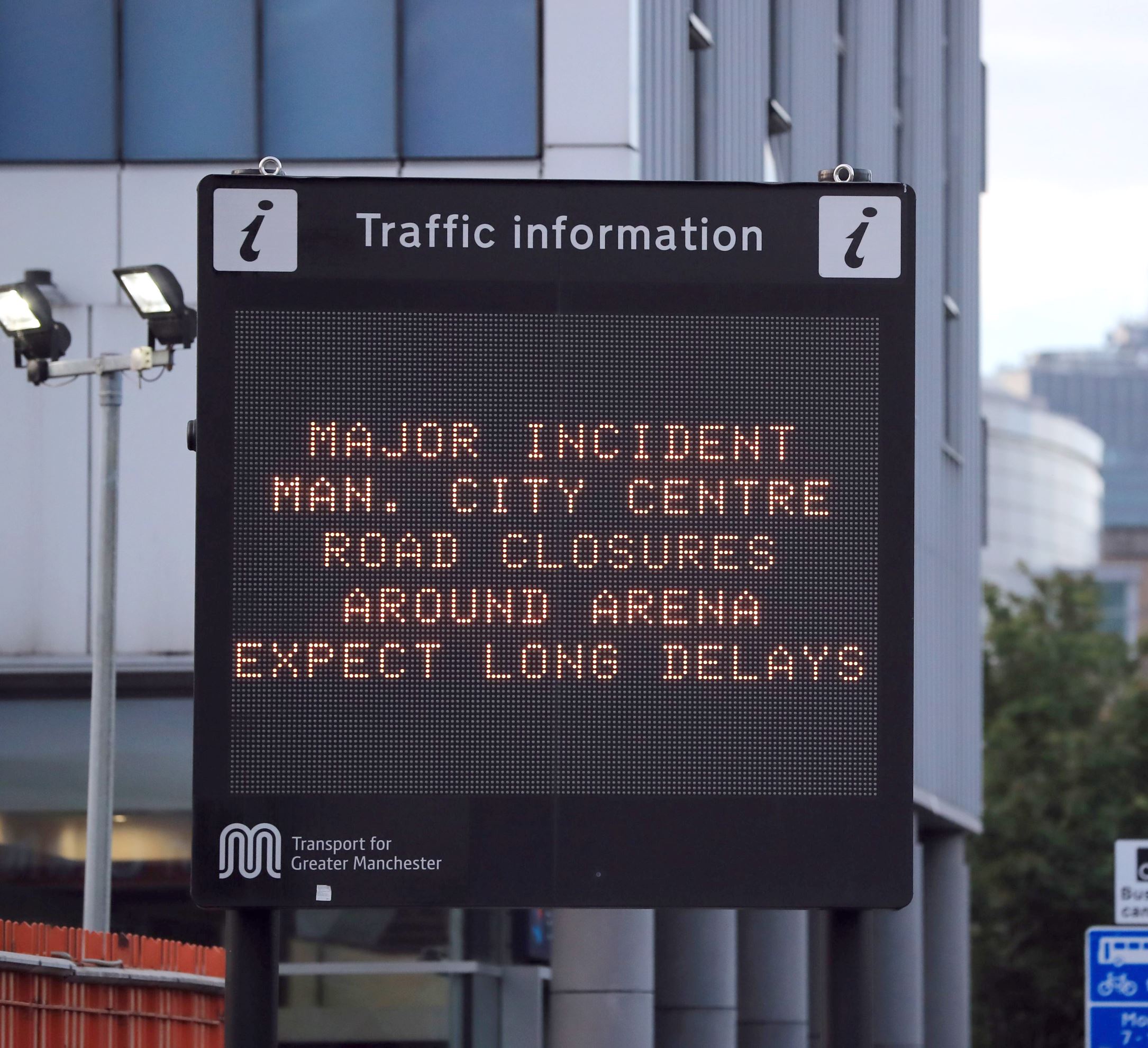 Slide 8 of 27: A sign near the Manchester Arena after a suspected terrorist attack at the end of a concert by US star Ariana Grande left 19 dead.