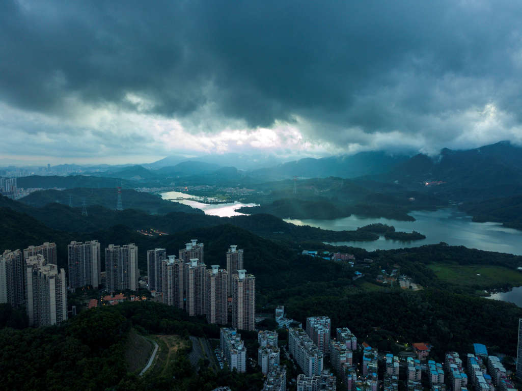 Slide 12 of 33: SHENZHEN, CHINA - JUNE 12:  Rain clouds are seen as Typhoon Merbok approaches on June 12, 2017 in Shenzhen, Guangdong Province of China. Typhoon Merbok draws near to south coast of China on Monday.  (Photo by VCG/VCG via Getty Images)