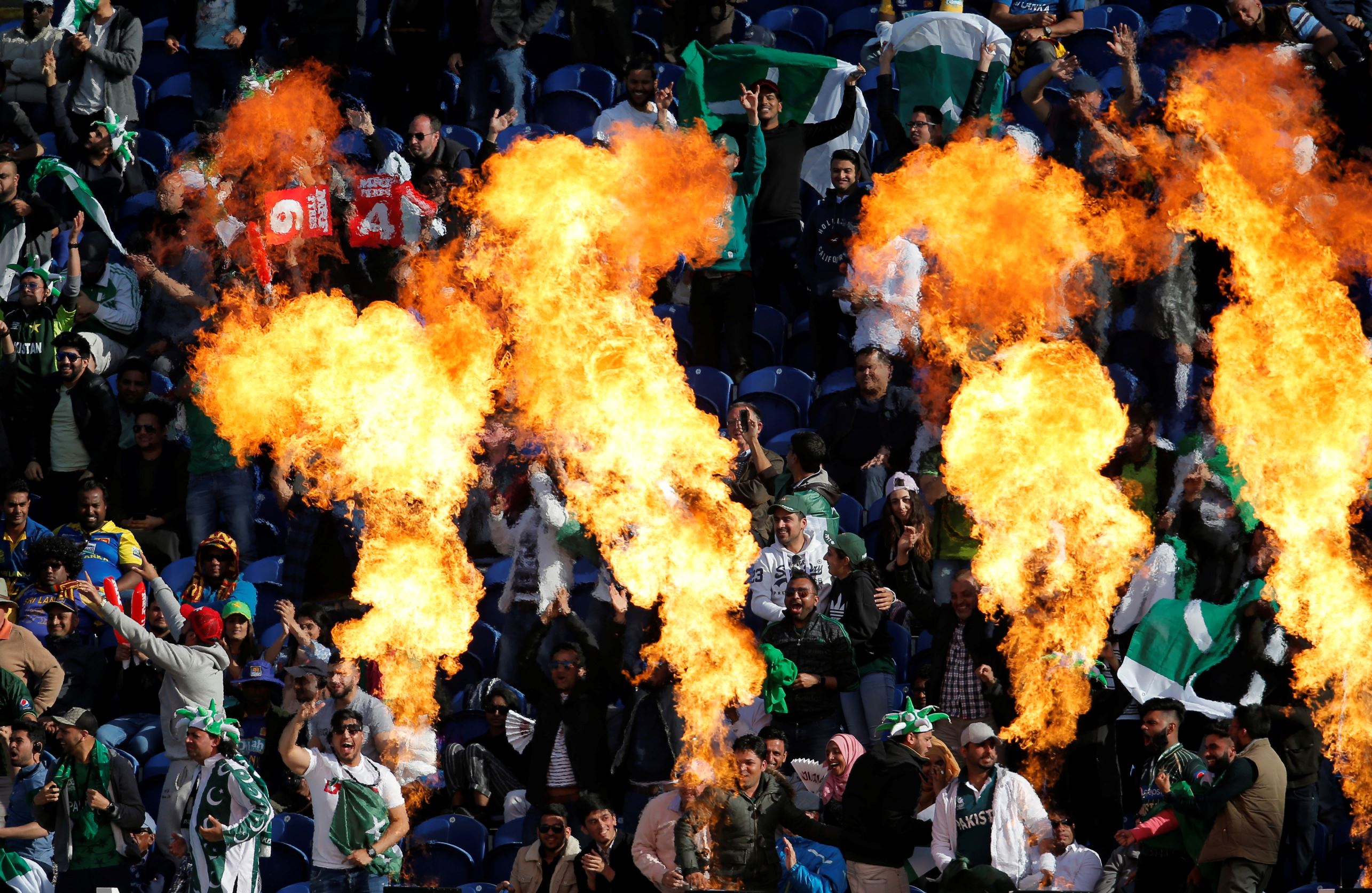Slide 25 of 33: Britain Cricket - Sri Lanka v Pakistan - 2017 ICC Champions Trophy Group B - Sophia Gardens - June 12, 2017 Pakistan fans Action Images via Reuters / Andrew Couldridge Livepic EDITORIAL USE ONLY. TPX IMAGES OF THE