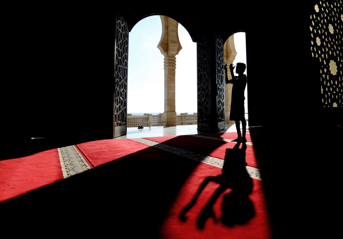 Slide 15 of 33: Ramadan celebrations, Gaza City - 10 Jun 2017 A Palestinian prays in the Al-Khalde mosque during the Muslim holy month of Ramadan.