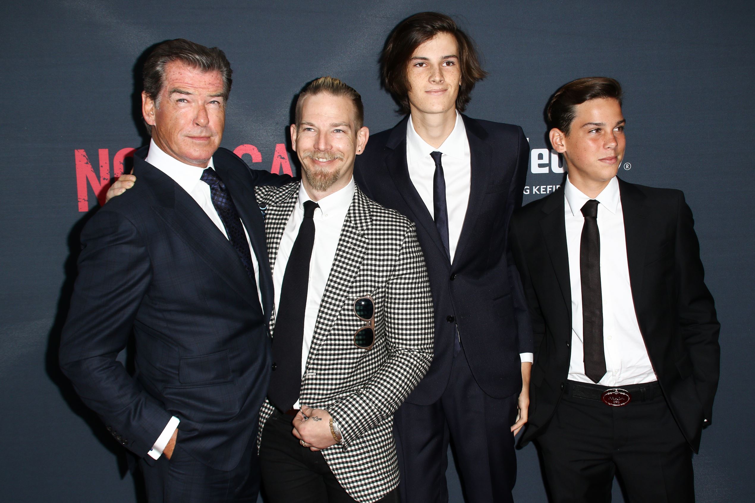 Slide 18 of 28: Pierce Brosnan, from left, Sean Brosnan, Dylan Brosnan and Paris Brosnan attend the LA Premiere of "No Escape" held at Regal Cinemas L.A. LIVE on Monday, Aug. 17, 2015, in Los Angeles. (Photo by John Salangsang/Invision/AP)