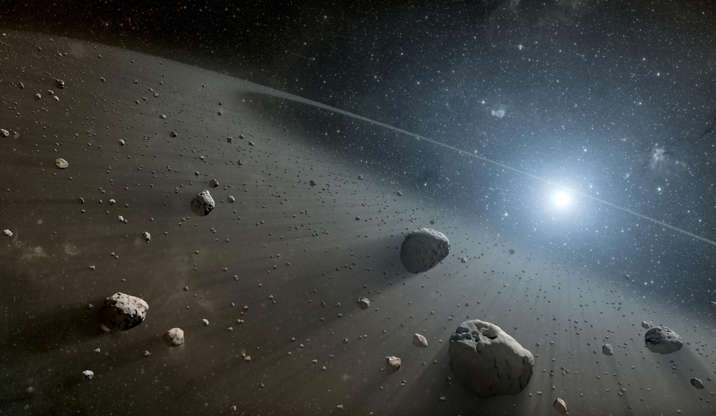 Slide 1 of 14: Nasa undated handout artist's impression of the asteroid belt surrounding the star Vega, the second brightest star in the northern night sky, which may have a family of planets similar to the Sun's, say scientists.