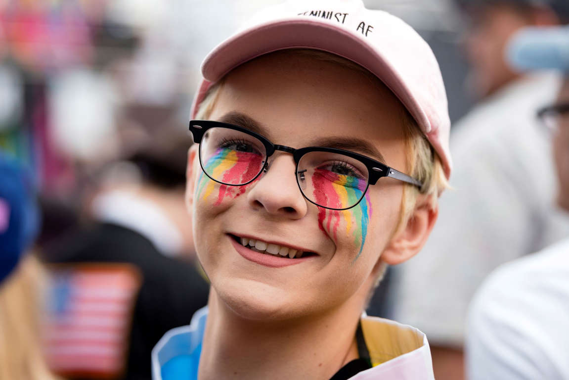Slide 37 of 57: 17-year old Jacob Gibson participates in LA Pride Resist March in Los Angeles, California on June 11, 2017. Tens of thousands of members of the LGBTQ community and their allies gather for the annual gay pride parade which this year was replaced with a Re