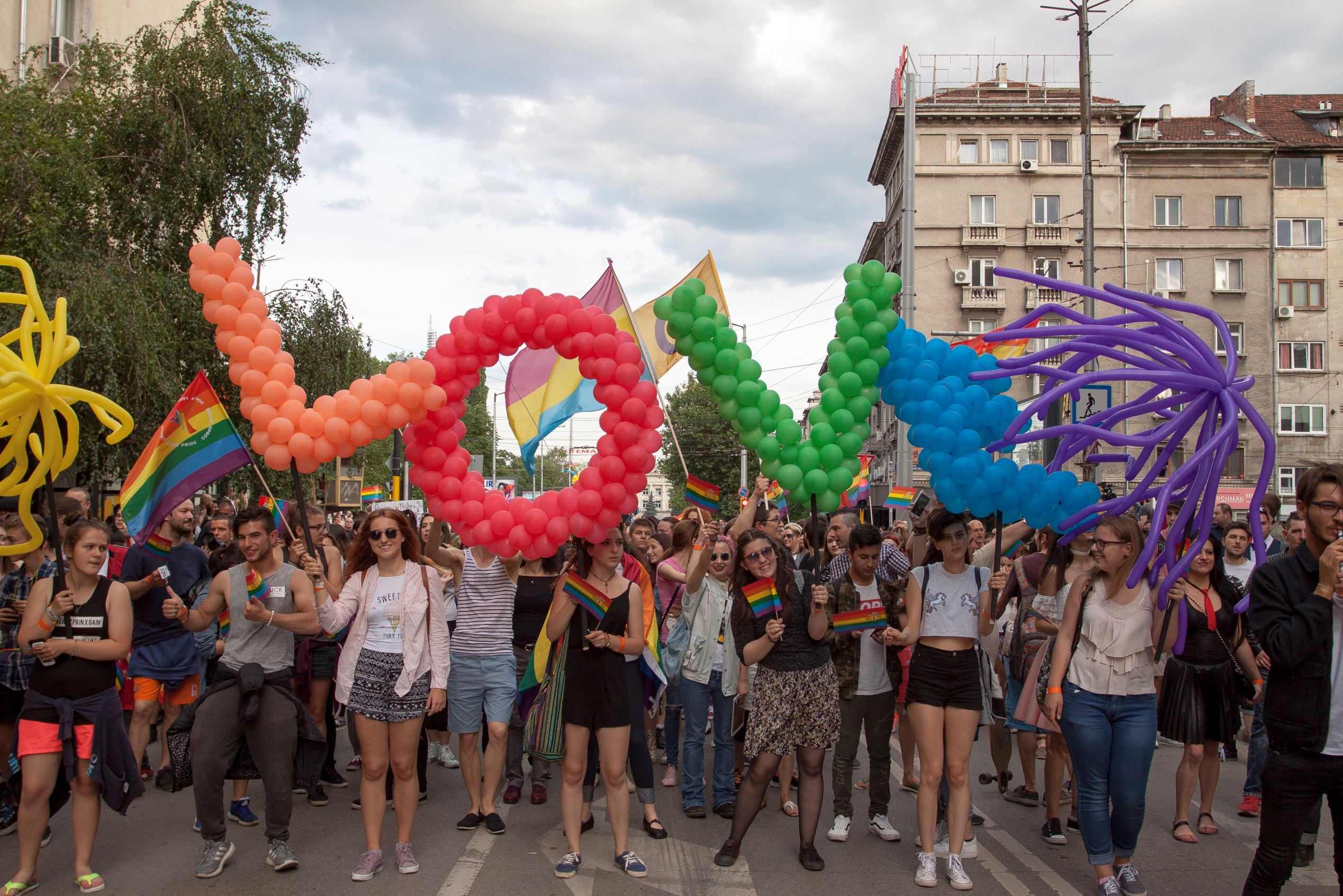 Slide 35 of 57: Sofia, Bulgaria - June 10, 2017: People celebrating at the 10th Sofia Gay Pride, Sofia Pride is the biggest annual event dedicated to the equality and human rights of all citizens and the biggest event increasing the visibility of LGBTI people in the country.