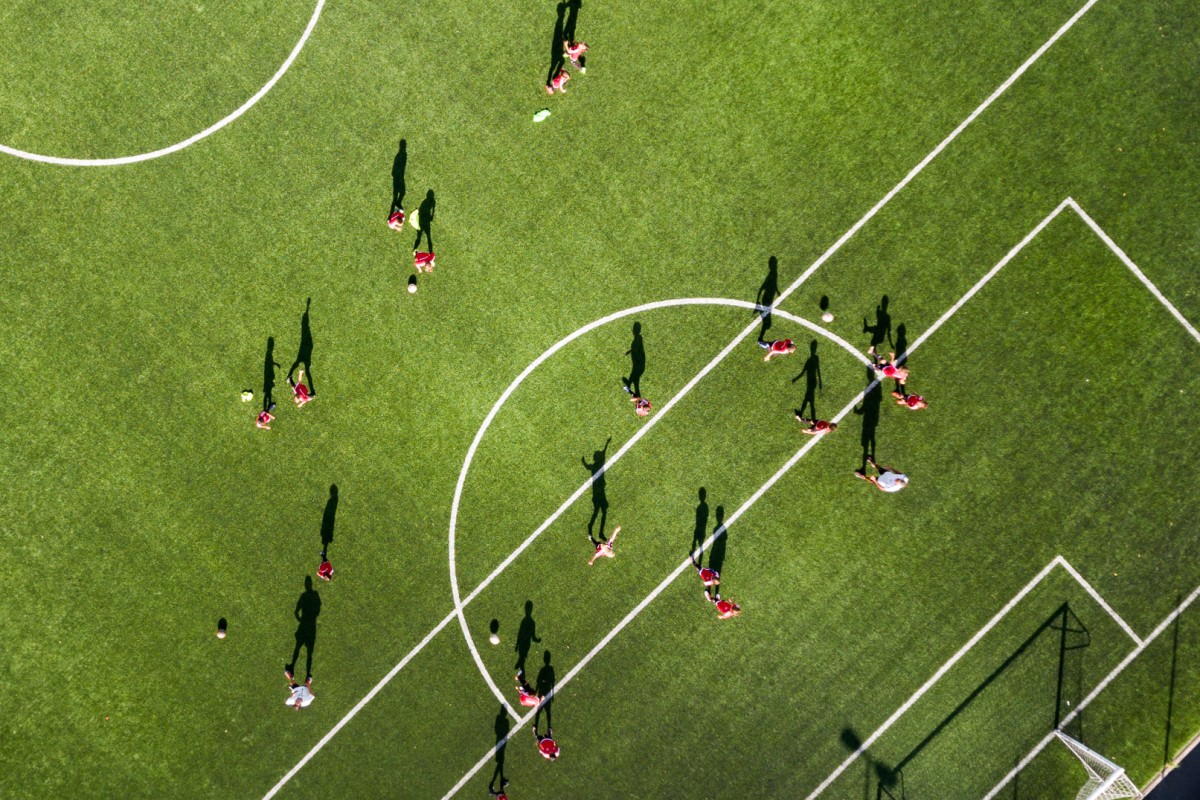 18/23 SLIDES © Children on the football practice by Karolis Jay