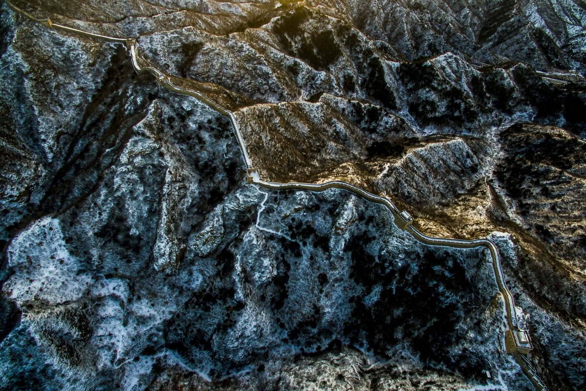 23/23 SLIDES © Great wall in sunset, covered with snow By ohlipang 