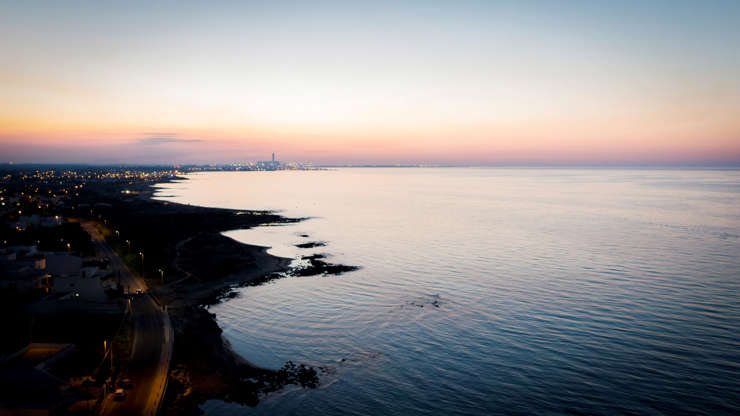 ÎÎ¹Î±ÏÎ¬Î½ÎµÎ¹Î± 82 Î±ÏÏ 100: An aerial view during the sunset in Casalabate, Italy, on July 9, 2017. Casalabate is a town on the Adriatic coast in the province of Lecce. It is a small village of fishermen and bathing establishments. (Photo by Manuel Romano/NurPhoto via Getty Images)