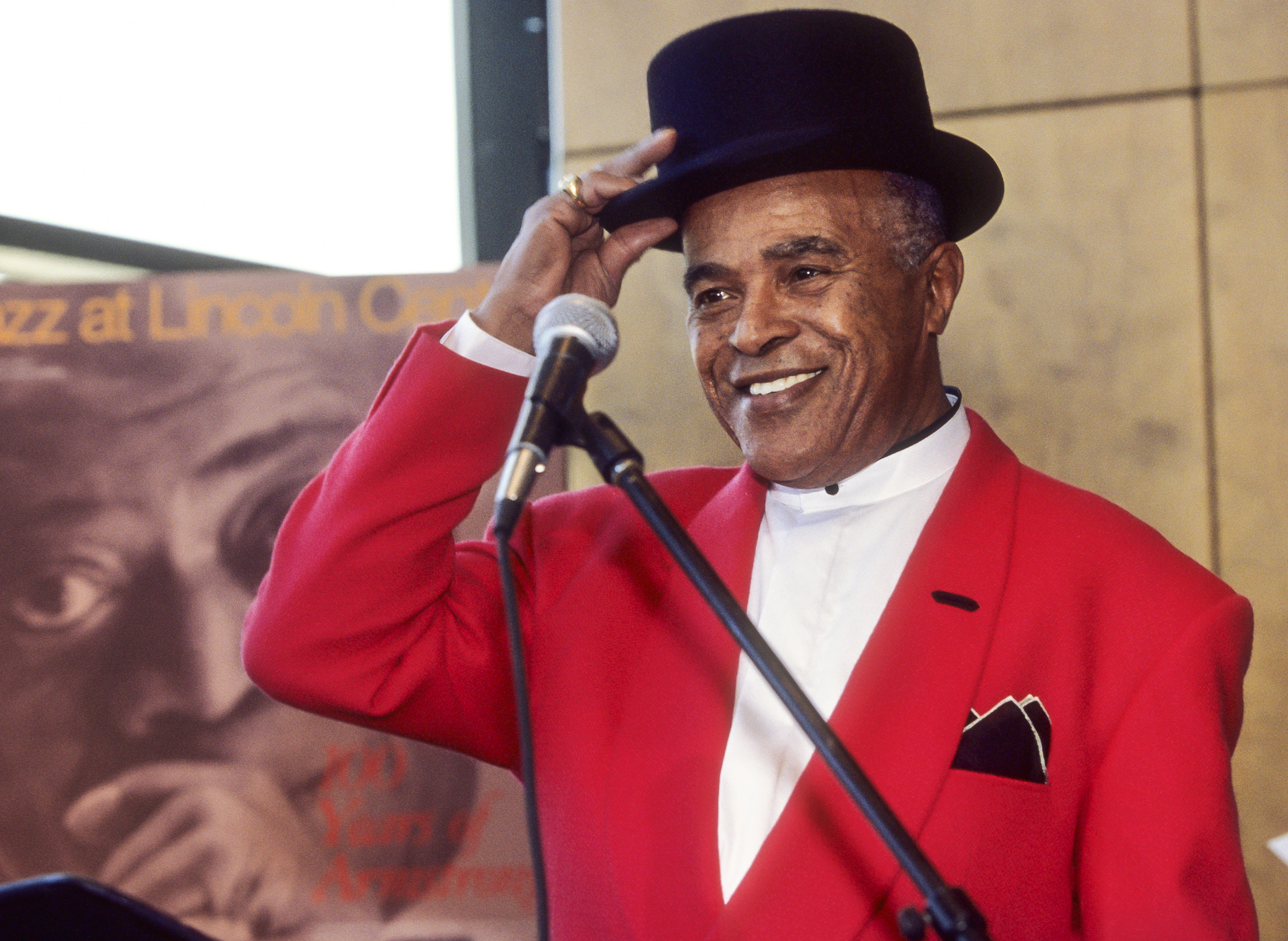 Slide 4 of 81: American Jazz musician Jon Hendricks tips his hat during a Jazz at Lincoln Center press conference in the Kaplan Penthouse, Lincoln Center, New York, New York, February 1, 2000. (Photo by Jack Vartoogian/Getty Images)