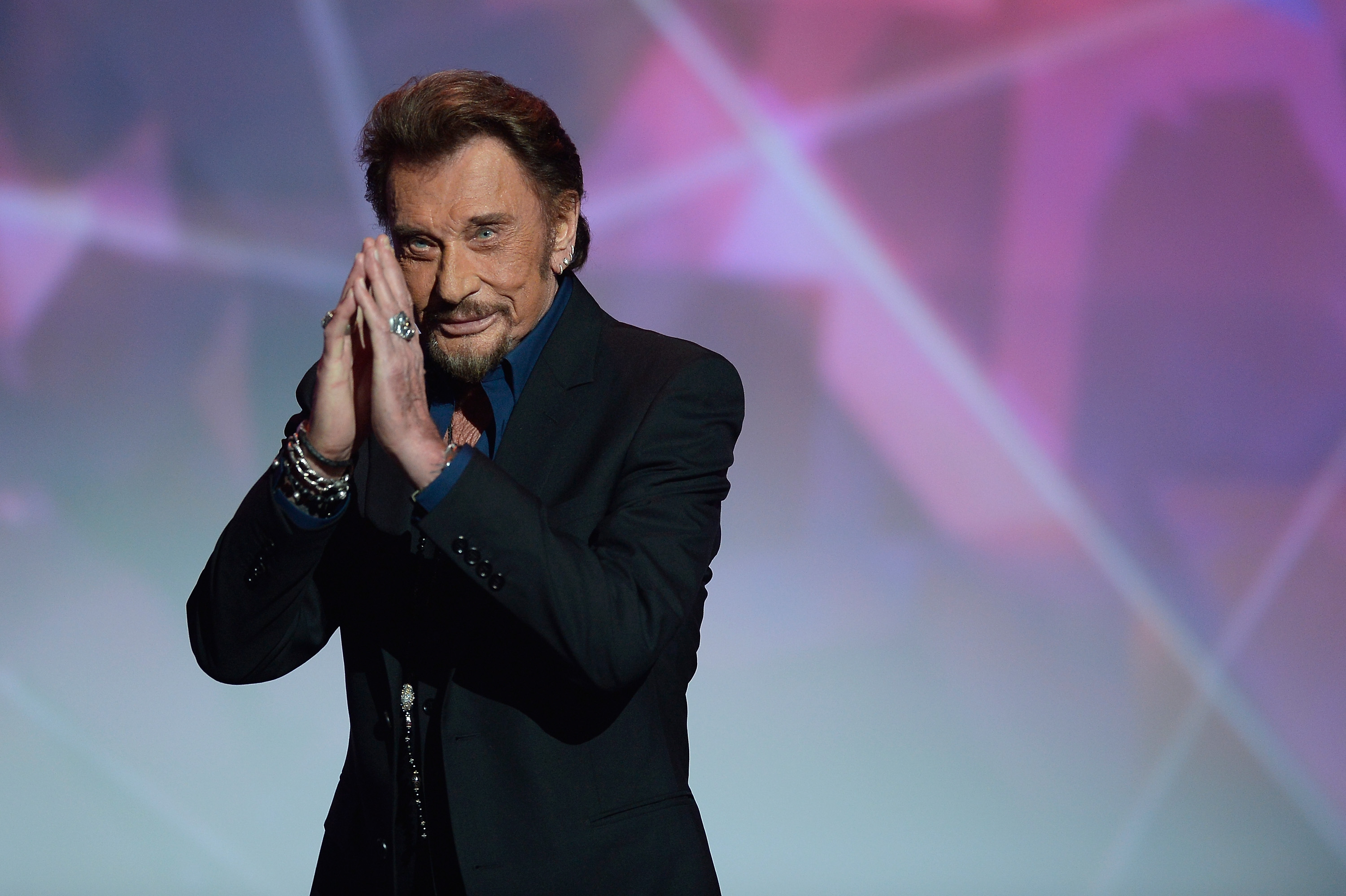 Slide 1 of 81: PARIS, FRANCE - FEBRUARY 12: Johnny Hallyday receives the award for Best Singing Album for 'De l'amour' during the 31st 'Victoires de la Musique' French Music Awards Ceremony at Le Zenith on February 12, 2016 in Paris, France. (Photo by Kristy Sparow/Getty Images)