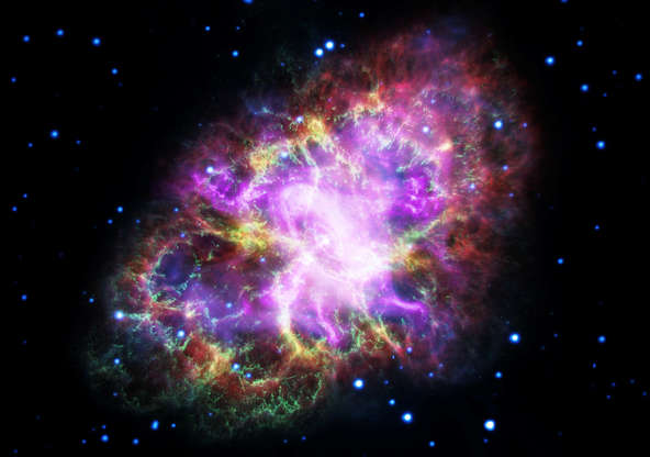 Slide 20 of 86: This composite image of the Crab Nebula, a supernova remnant, was assembled by combining data from five telescopes spanning nearly the entire breadth of the electromagnetic spectrum: the Karl G. Jansky Very Large Array, the Spitzer Space Telescope, the Hubble Space Telescope, the XMM-Newton Observatory, and the Chandra X-ray Observatory. Photo released on May 10.