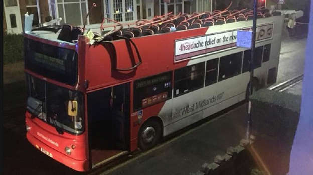 Roof of double-decker bus completely ripped off by low bridge
