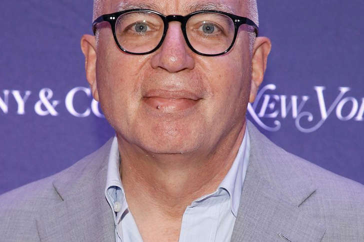 a man wearing glasses: Credits: WireImage