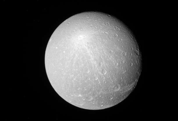 Slide 24 of 86: A view of Saturn's moon Dione released by NASA on February 21, 2017, looking toward the Saturn-facing side of Dione. The image was taken with the Cassini spacecraft narrow-angle camera on Nov. 26, 2016 using a spectral filter which preferentially admits wavelengths of near-infrared light centered at 727 nanometer