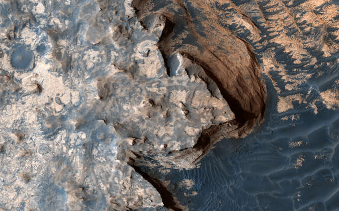 Mars Reconnaissance Orbiter - NASA/JPL/University of Arizona/Handout via Reuters Slide 21 of 86: An image acquired by the High Resolution Imaging Science Experiment (HiRISE) camera aboard NASA's Mars Reconnaissance Orbiter on April 18, 2017, shows a rugged cliff edge. Image released June 22, 2017. NASA/JPL/University of Arizona/Handout via REUTERS