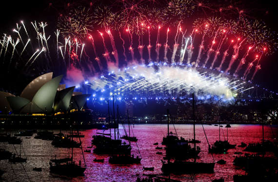 Slide 1 de 49: SYDNEY, AUSTRALIA - JANUARY 01:  Fireworks explode off the Harbour Bridge and Opera House to bring in the New Year on New Year's Eve on January 1, 2018 in Sydney, Australia.  (Photo by James D. Morgan/Getty Images)