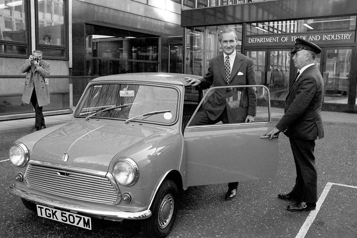 Tom Boardman, Minister for Industry, sets an example in fuel economy when he chooses a Mini over an Austin 1800 or Rover 3500