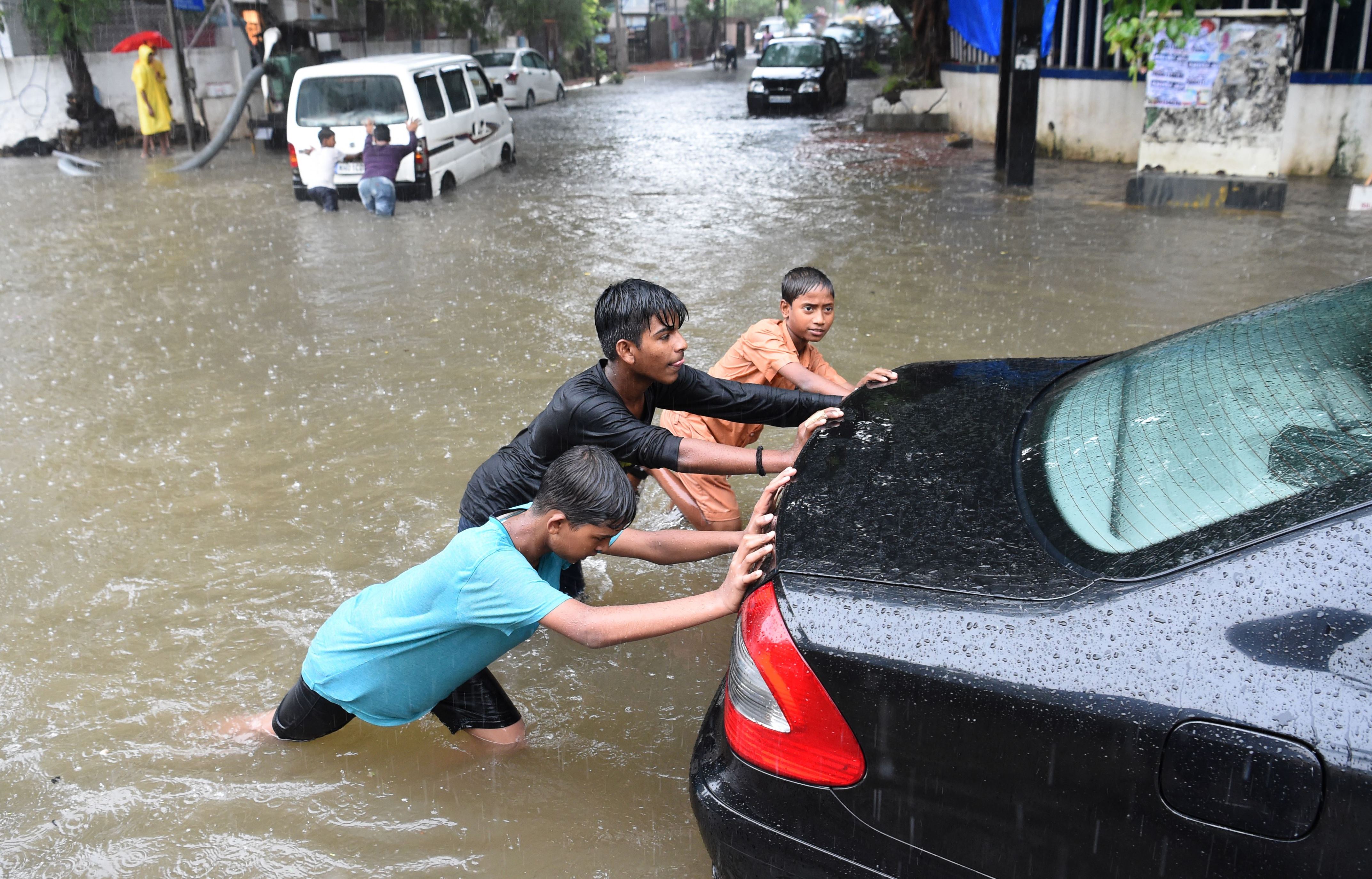Car swept away after heavy rainfall in Gwalior