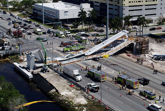 Slide 1 of 15: View of  the main span of the FIU-Sweetwater UniversityCity Bridge after collapsing five days after been installed over SW 8 Street-State Road 41 on Thursday, March 15, 2018.