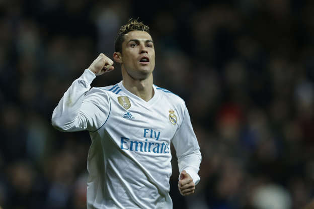 Real Madrid's Cristiano Ronaldo celebrates after scoring his side's fifth goal during a Spanish La Liga soccer match between Real Madrid and Real Sociedad at the Santiago Bernabeu stadium in Madrid, Saturday, Feb. 10, 2018. (AP Photo/Francisco Seco)