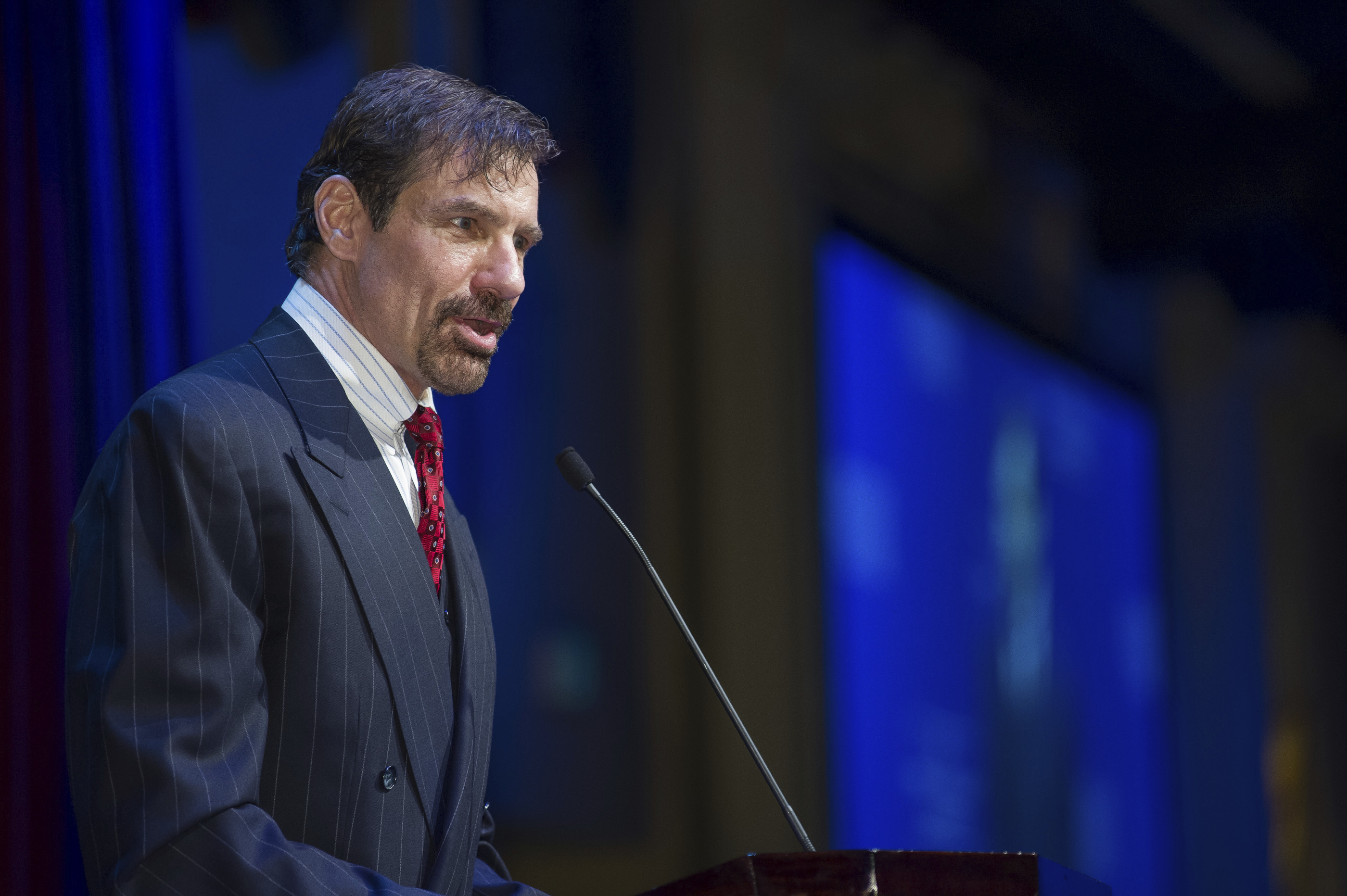 FILE - In this May 30, 2015, file photo, Henry T. Nicholas III talks during the Nicholas Academic Center's 2015 Graduation ceremony at the Disneyland Hotel in Anaheim, Calif. After his sister was murdered, Nichols III spent millions to enshrine a so-called bill of rights for crime victims into California's constitution. Now, he is taking his effort into the nation's heartland, including Oklahoma, spending millions on teams of lobbyists and PR companies to influence legislatures and amend state constitutions all over the country. (Eric Reed/AP Images for Nicholas Academic Centers, File)