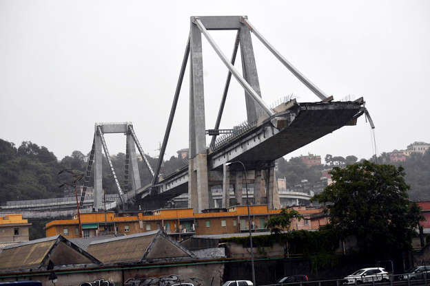 Slide 3 de 20: A large section of the Morandi viaduct upon which the A10 motorway runs collapsed in Genoa, Italy, 14 August 2018.